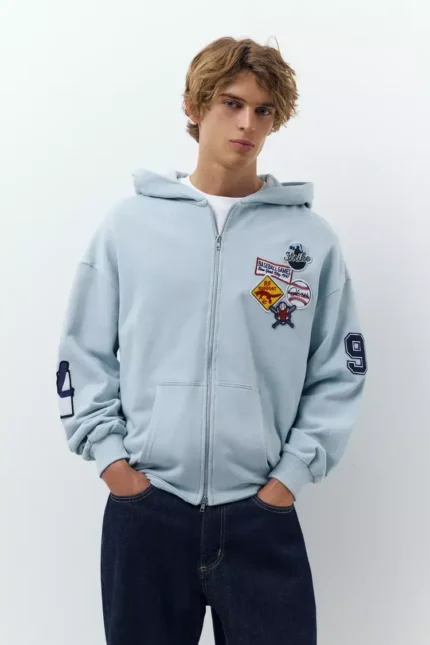 Sudadera capucha cremallera parches 1.webp